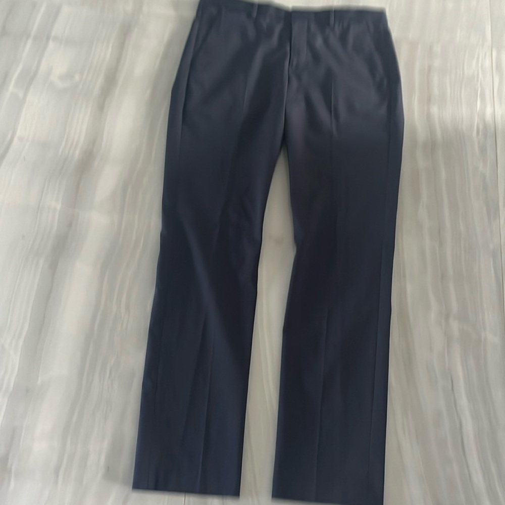 Men’s Express navy blue flat front. Size 32 waist, 34 length.